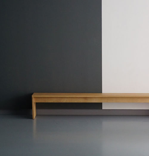 View of empty seat against wall