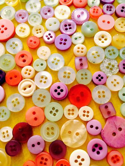 Full frame shot of buttons on fabric
