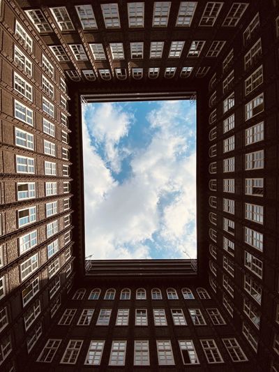 Low angle view of skylight in building in hamburg against sky