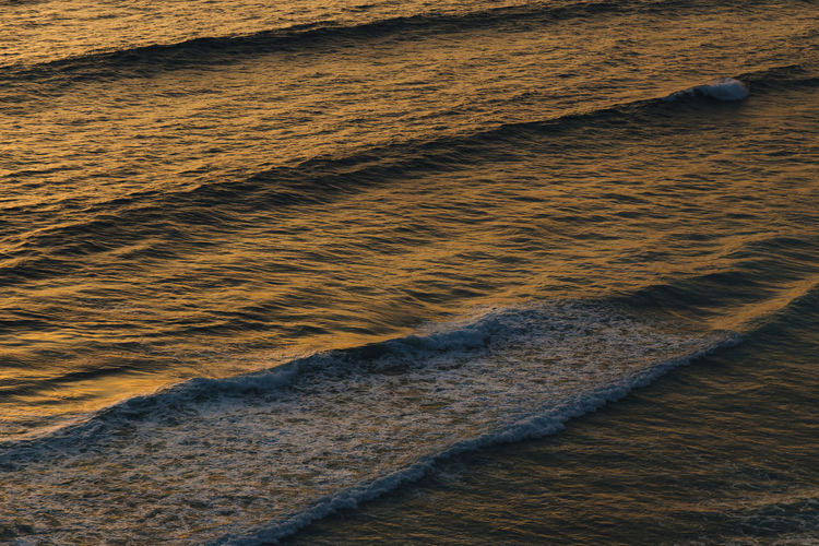 Sunset at indian ocean coastline