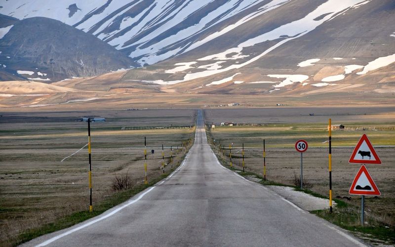 Road passing through country road