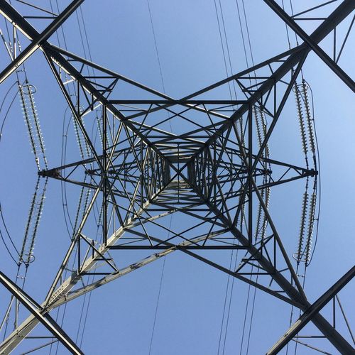 Low angle view of electricity pylon