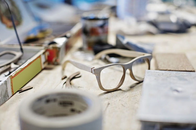 Eyewear frame on table at workshop