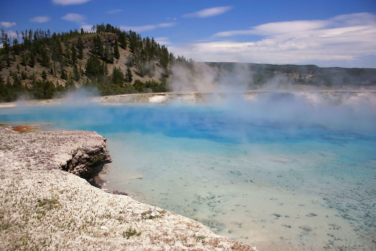 Blue turquoise geyser pond, yellowstone, wyoming, usa