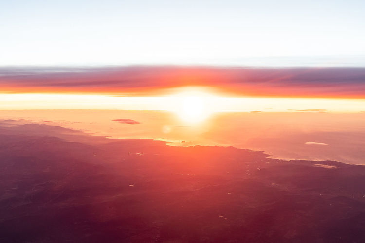 Scenic view of dramatic sky during sunset