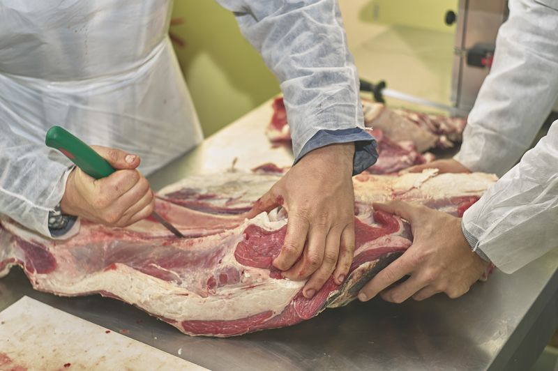 Midsection of man preparing food