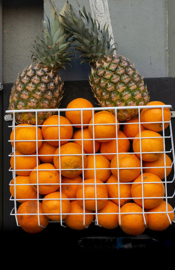Close-up of orange fruits for sale in market