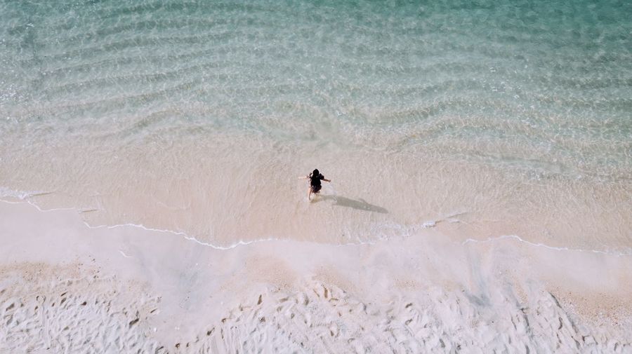 Aerial view of woman at beach