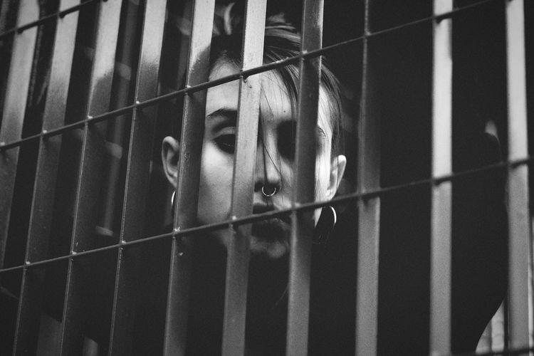 Close-up of girl in cage