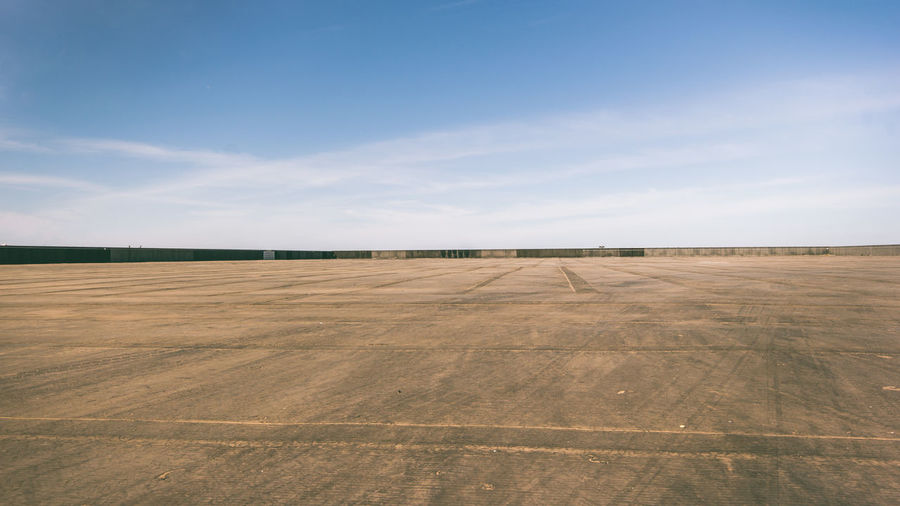 Scenic view of land against sky