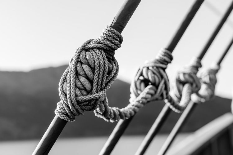 Close-up of ropes against sky