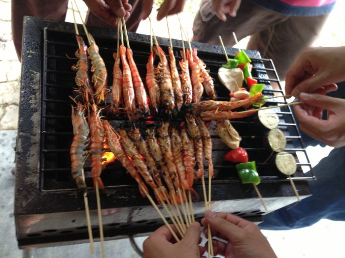 Close-up of barbecuing shrimps