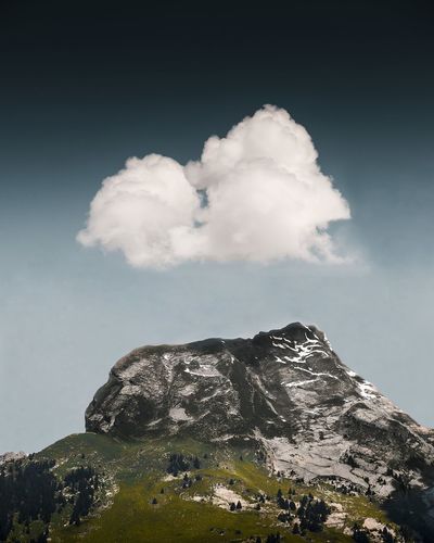 Low angle view of rocks against sky