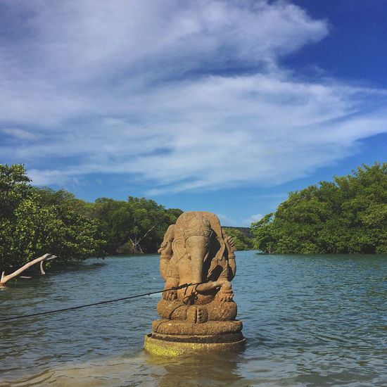 Ganesha idol in river at pono point