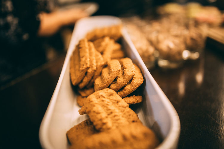 Close-up of served cookies in plate on table