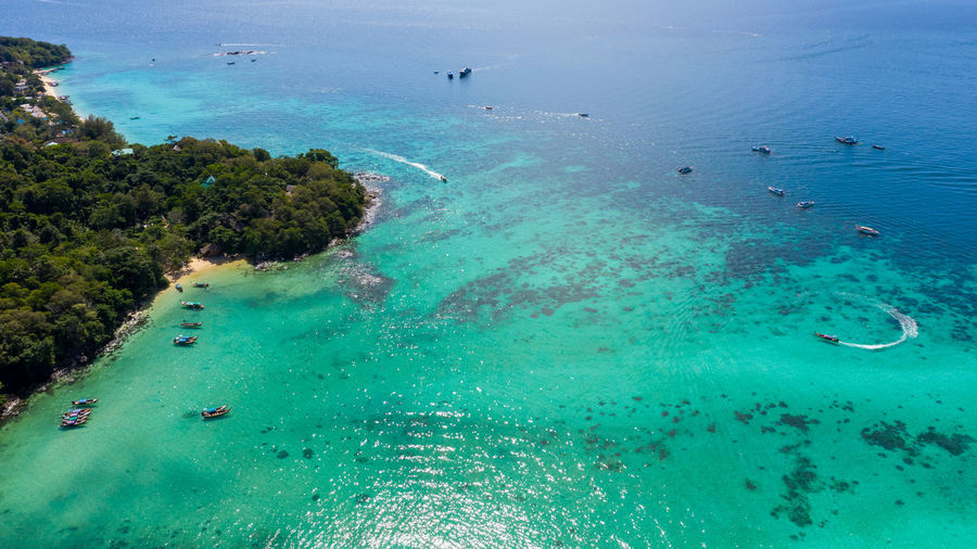 Phi phi island and tourist boat at krabi thailand aerial view