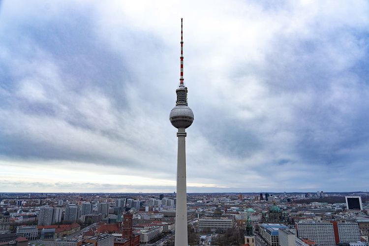 Communications tower in city against sky in berlin