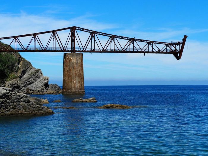 View of bridge over sea against sky