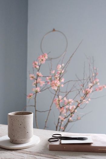 Close-up of coffee cup on table