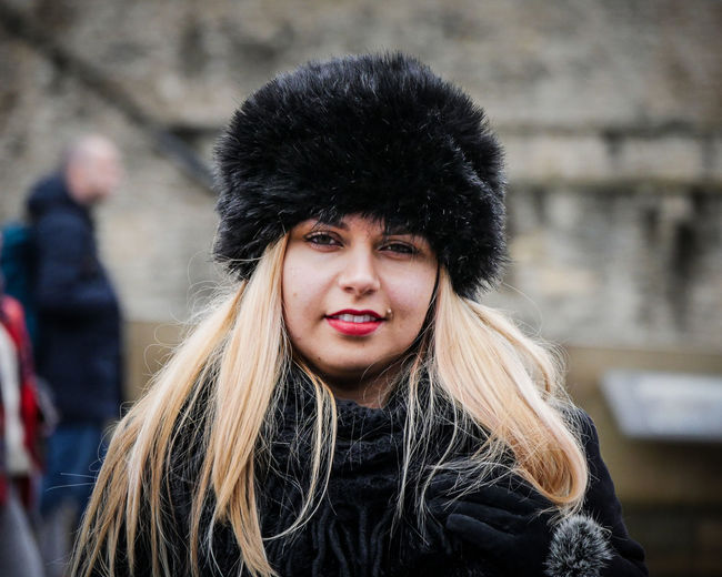 Portrait of young woman during winter