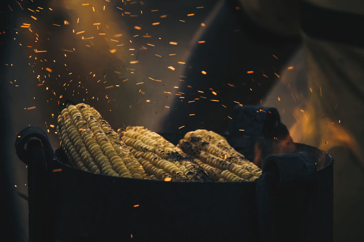 Close-up of corn cobs on barbecue grill