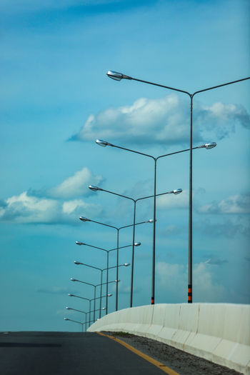Low angle view of street light against sky
