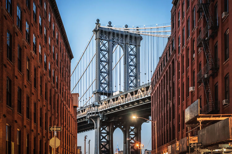 Low angle view of brooklyn bridge in new york city