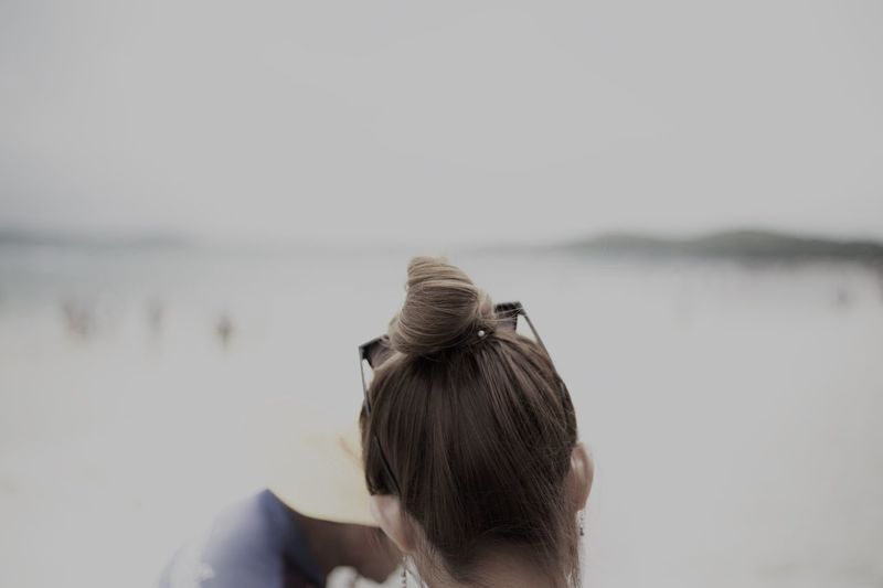Rear view of woman with hair bun