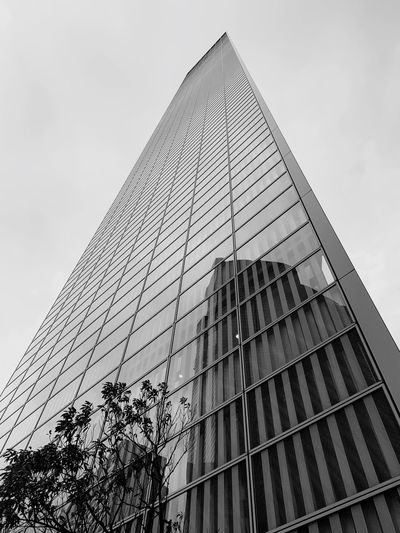 Low angle view of modern building against sky