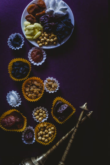 Directly above shot of dried fruits in plate on table