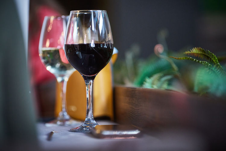Close-up of wineglass on table