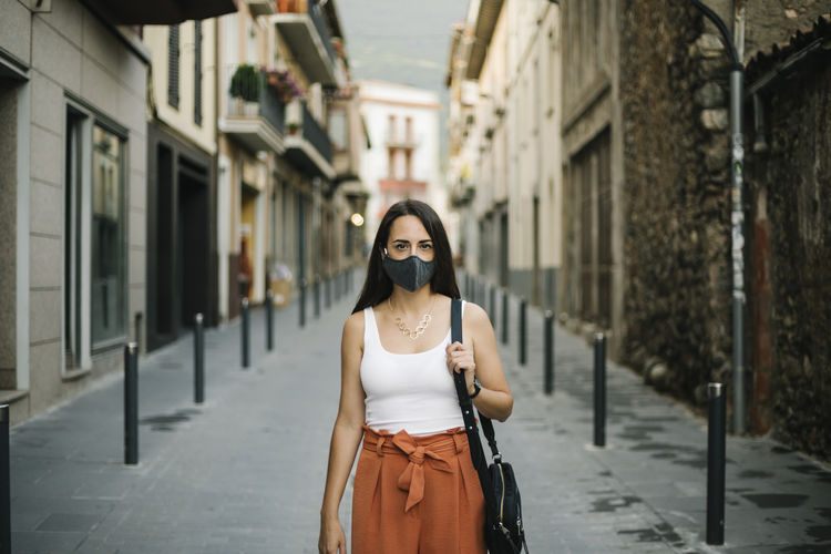 Woman in face mask in town