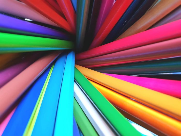 Full frame shot of multi colored pencils on table