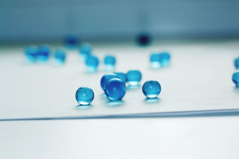 Close-up of blue balls on table
