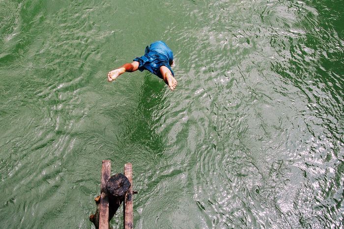 High angle view of man diving into sea
