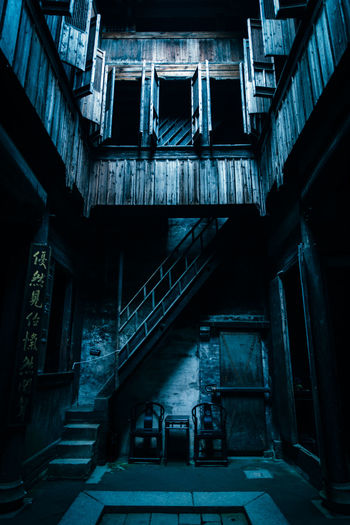 Low angle view of steps in old abandoned building