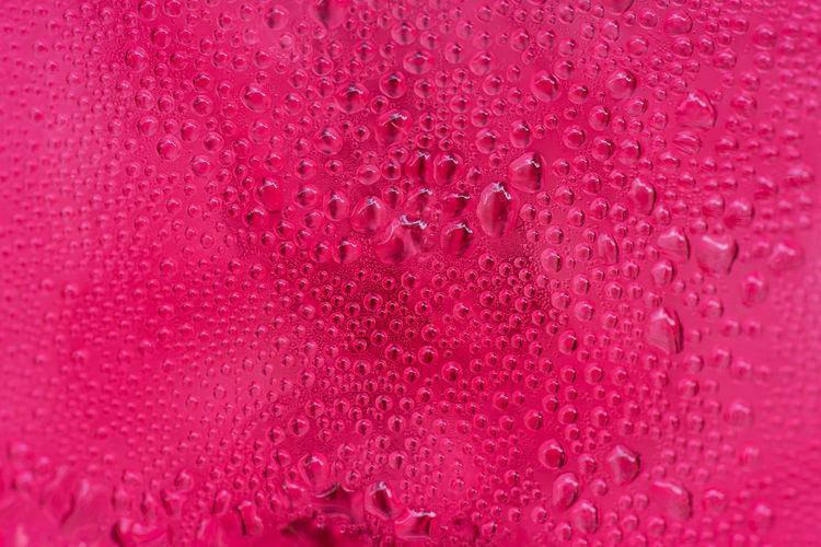 Full frame shot of pink water drops