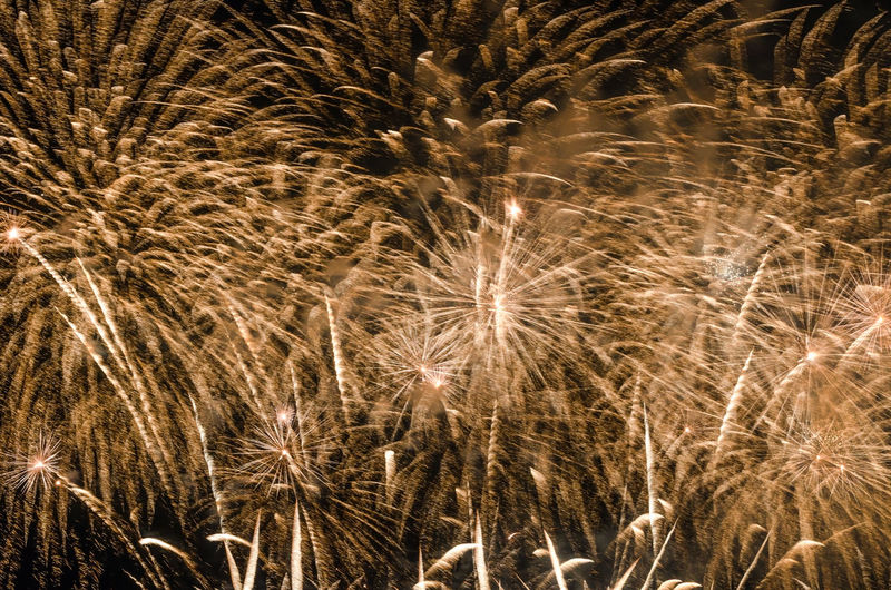 Full frame shot of firework display at night