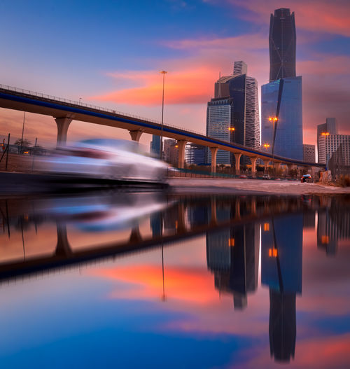 Reflection of city at sunset