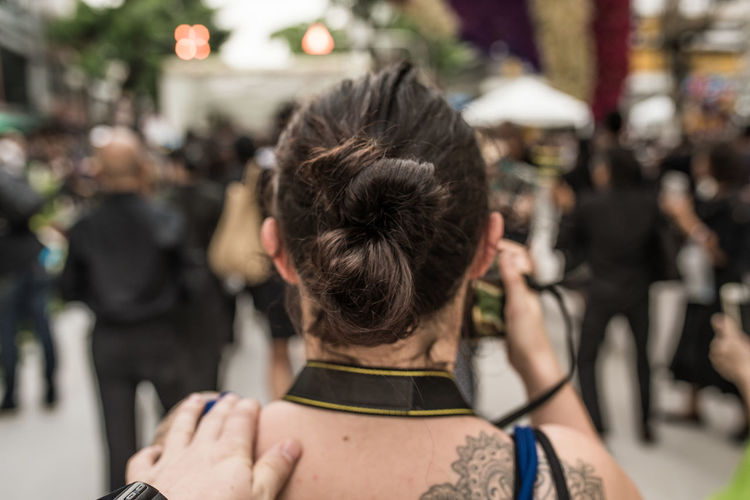 Rear view of woman with hair bun