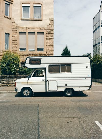 Side view of a camper van on street