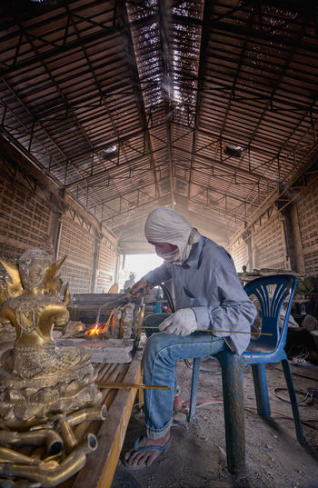 Man working in shopping mall