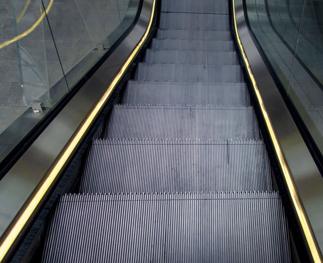 A modern escalator moving stairway