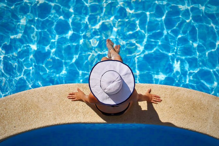 High angle view of woman at swimming pool