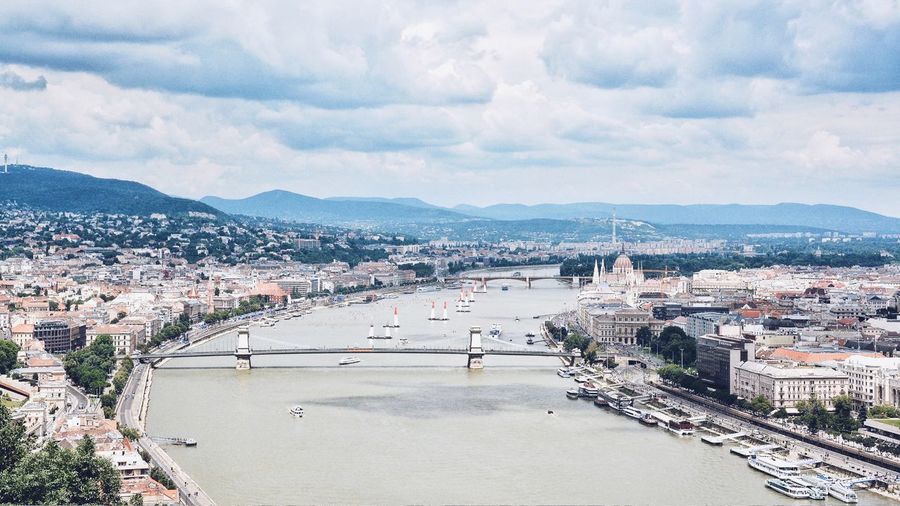 High angle view of danube river amidst buildings against sky