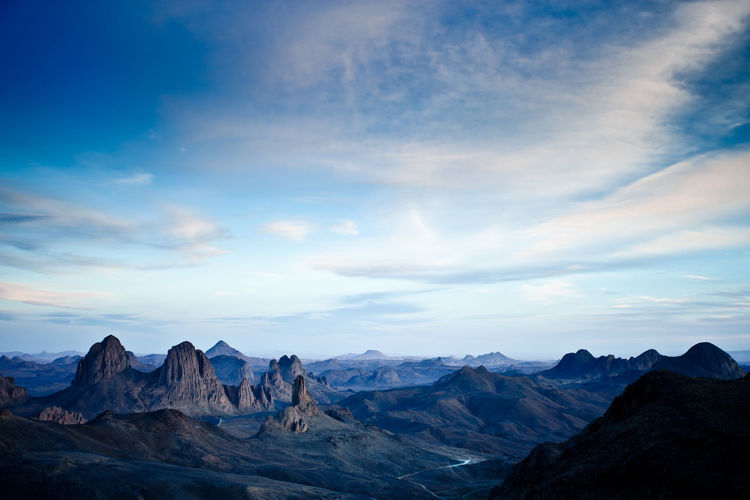 Scenic view of mountains against sky during sunset