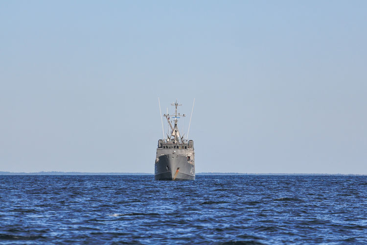 Ship in sea against clear sky