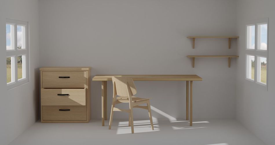 Empty chairs and table in building