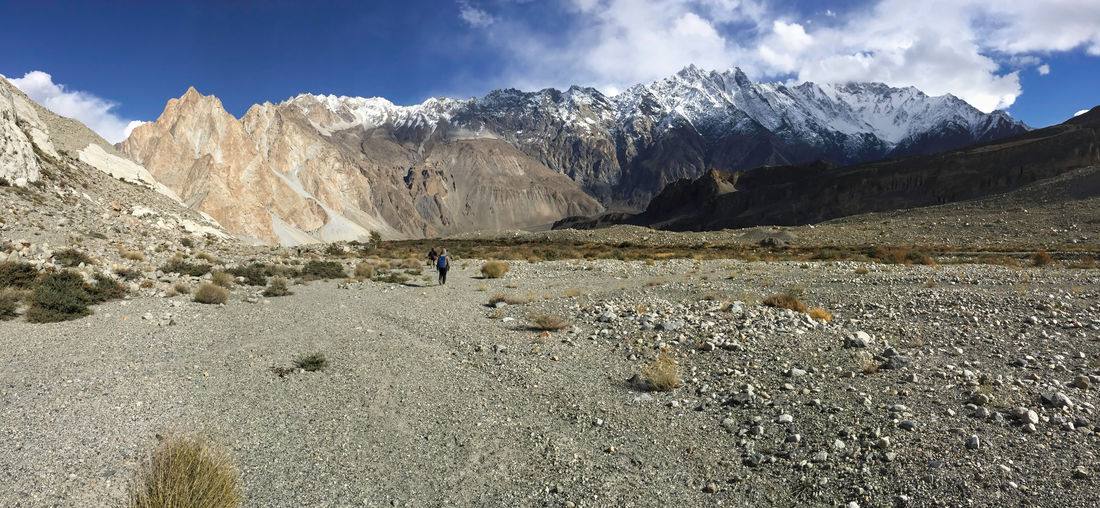 Wilderness area in passu amid karakoram mountain range against sky. gilgit baltistan, pakistan.