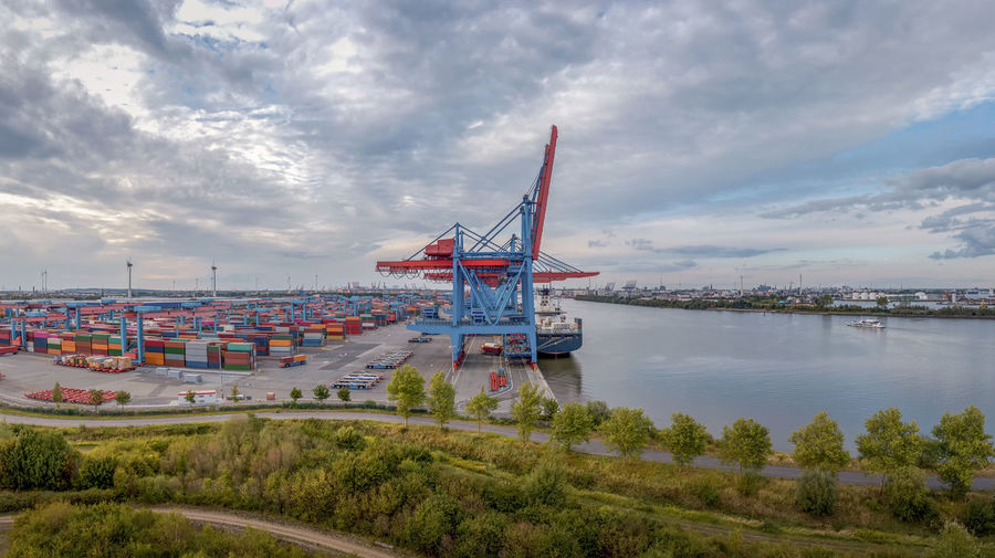Panoramic view of bay against sky